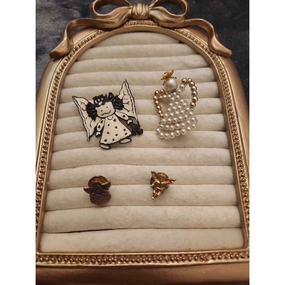 4 piece angel brooch and pins